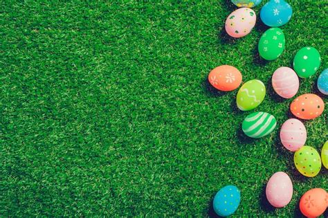 Premium Photo Colorful Easter Eggs On Green Grass