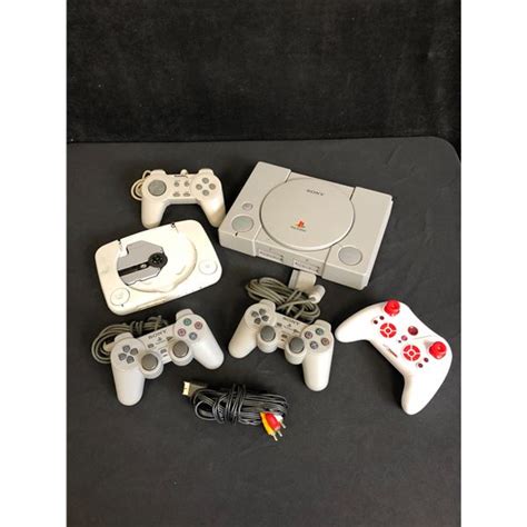 SONY PLAYSTATION AND ACCESSORIES BUNDLE