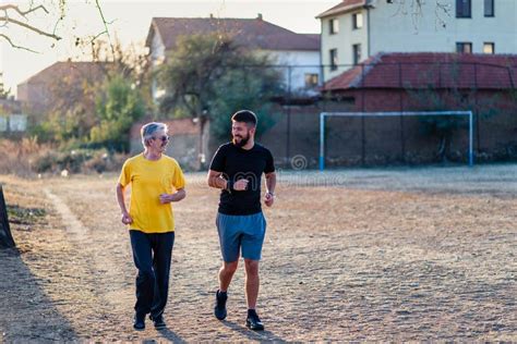 Men Running In The Park Stock Image Image Of Runners 136583027