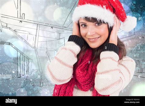 Composite Image Of Cute Brunette Posing With Her Hands On Head Stock Photo Alamy