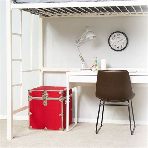 a bedroom with a bunk bed, desk and chair next to a red suitcase on the ...