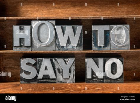 How To Say No Phrase Made From Metallic Letterpress Type On Wooden Tray