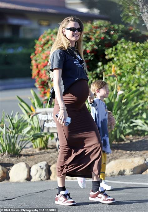 Behati Prinsloo Shows Off Growing Baby Bump As She Enjoys Day Out With