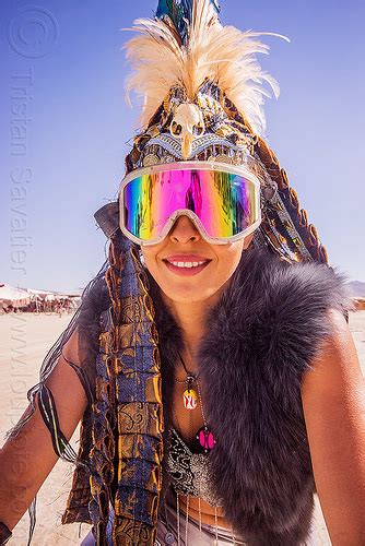 Burning Man Woman With Tribal Feather Headdress And Mirror Goggles