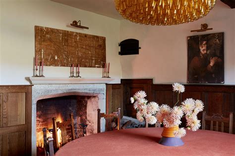 A Cotswold house has been revived by its creative owners, who have complemented its blend of old ...