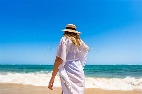 Beautiful Mature Woman Walking On Sunny Sandy Paradise Beach On Armona Island In Portugal