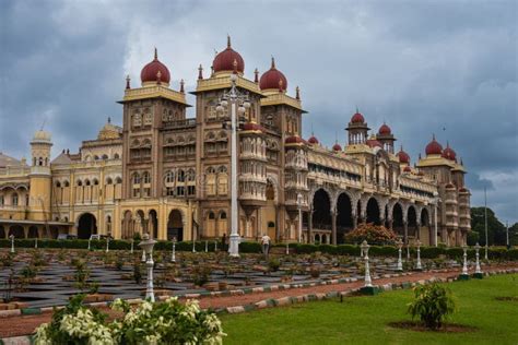 Tourists Visiting The Historic And Grand Mysore Palace Also Called Amba