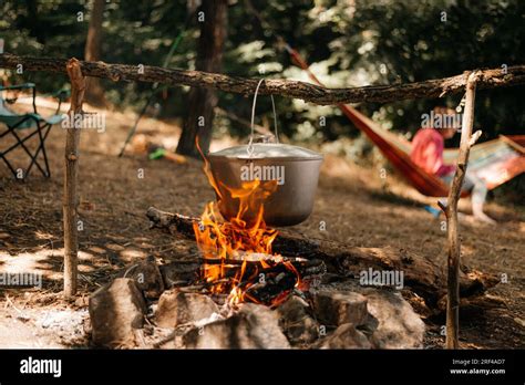 Cast Iron Pot Cooks Over Open Fire In A Campsite In Forest 56 OFF