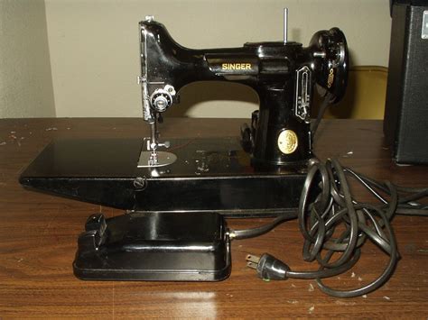 SINGER Portable Electric Sewing Machine 221-1 by SCORPIONATRIX