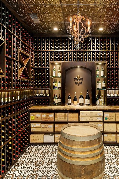 A Wine Cellar With Wooden Barrels And Chandelier