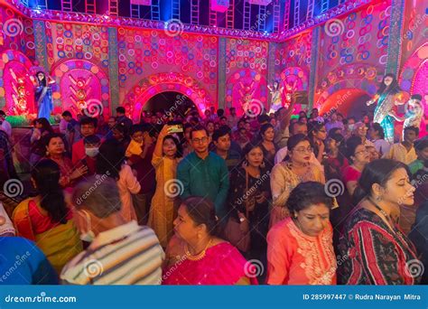 hindu devotees gathered  praying  goddess durga  puja pandal
