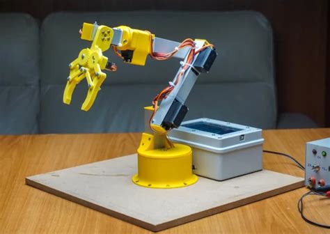 Robot Arm You Can Build At Home Robot Arm Robotic Arm Diy Arduino