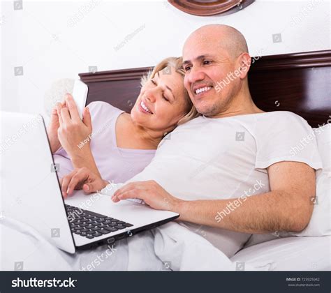 Smiling Mature Husband Wife Lying Bed Stock Photo 723925942 Shutterstock