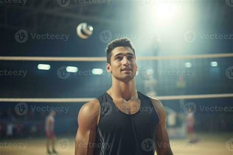 Male volleyball players are competing on the indoor volleyball court ...