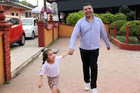Single Dad Plays With His Year Old Latina Daughter In The Park They Run And Have Fun To