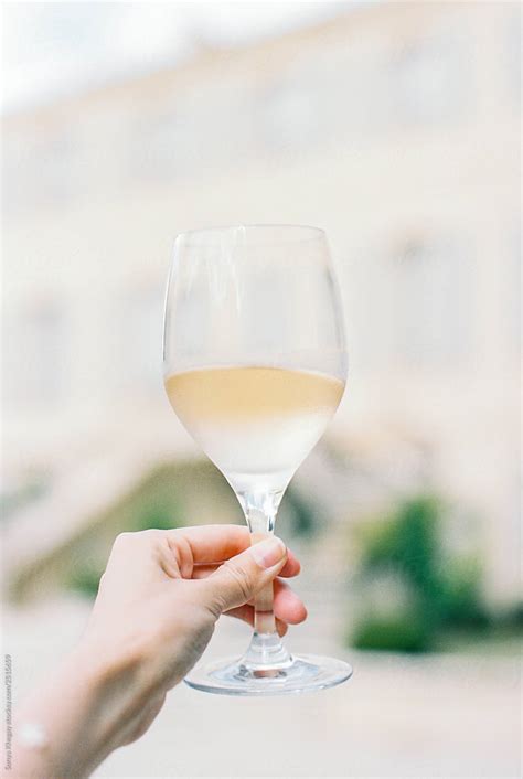 Woman Holding A Wine Glass By Stocksy Contributor Sonya Khegay