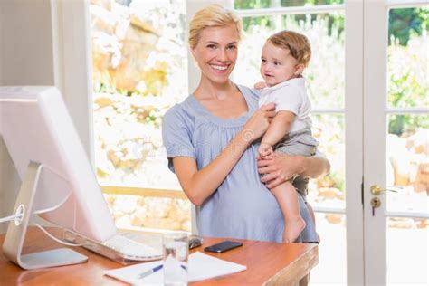 Blonde Woman With His Son Using Computer Stock Photo Image Of Keyboard Hair