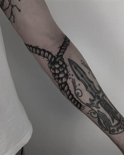 Rope tattoo by Krzysztof Szeszko - Tattoogrid.net