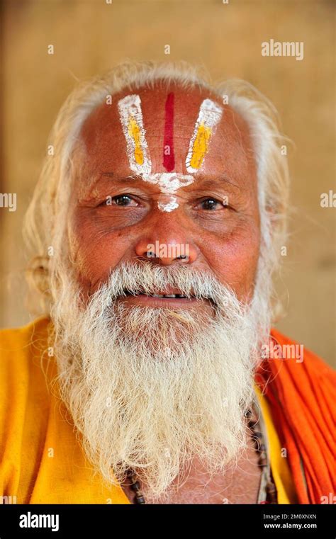 Portrait Of A Sadhu Holy Man On The Ghats Of River Ganges Varanasi