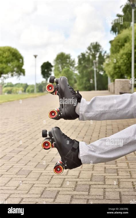 Roller skates and legs when falling while skating. Accident and crash ...