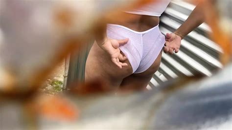 Camera Records Woman In Beach Dressing Room Without Realizing It Latina Recorded By Pervert