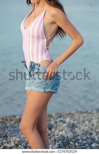 Woman Striped Bikini Takes Off Her Stock Photo Shutterstock