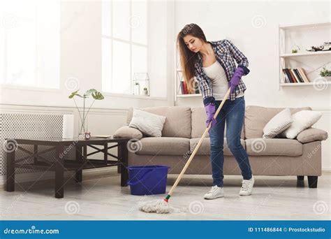 Young Woman Cleaning House With Mop Stock Photo Image Of Housekeeping