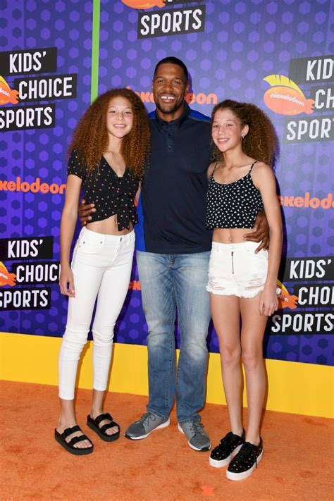 Michael Strahan shares photo of his twin daughters enjoying beach day in swimsuits