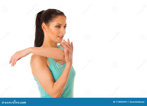 Woman Stretching Her Arms After Workout In Fitness Gym Isolated Stock