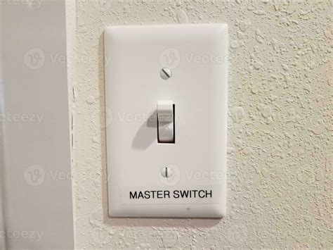 light switch on wall with master switch label 14259741 Stock Photo at Vecteezy