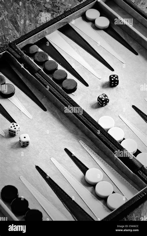 Backgammon Game With Playing Pieces And Dice Stock Photo Alamy