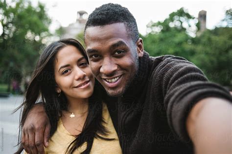 "Couple Taking A Selfie In The City" by Stocksy Contributor "Simone ...