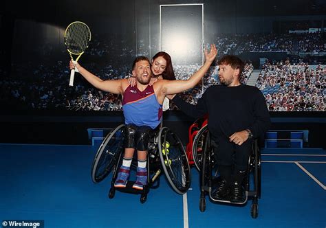 Australian of the Year Dylan Alcott gets playful with girlfriend Chantelle Otten as he unveils a ...