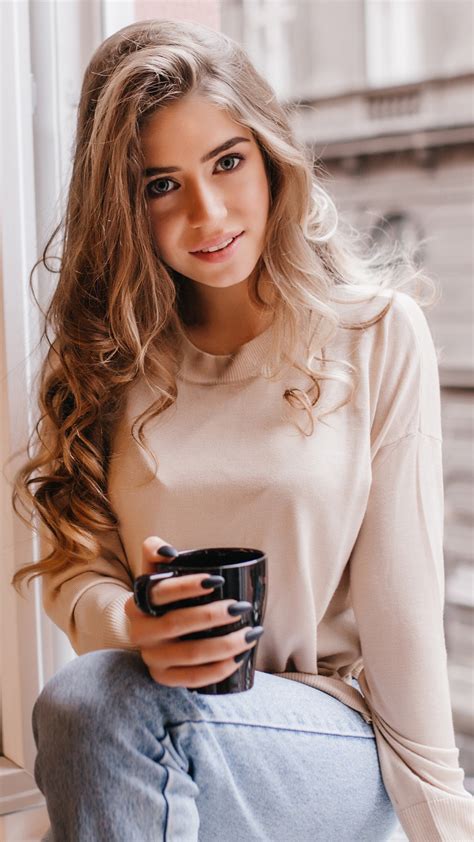 Brunette Girl Model Is Sitting On Window Wall And Holding Black Cup K Hd Model Wallpapers Hd