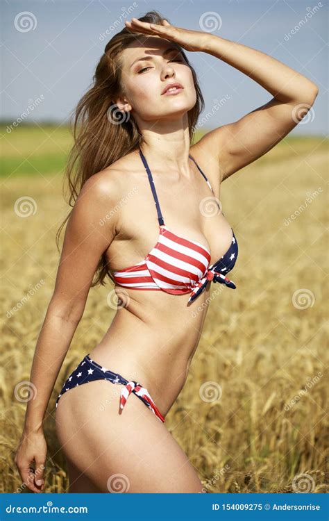 Woman In American Flag Bikini In A Wheat Field Stock Image Image Of