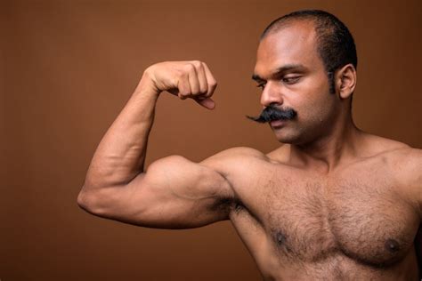 Premium Photo Closeup Profile View Of Muscular Indian Man With Mustache Shirtless