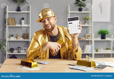 Funny Man Holding Calculator Counting Profit At Home With Cash Money On