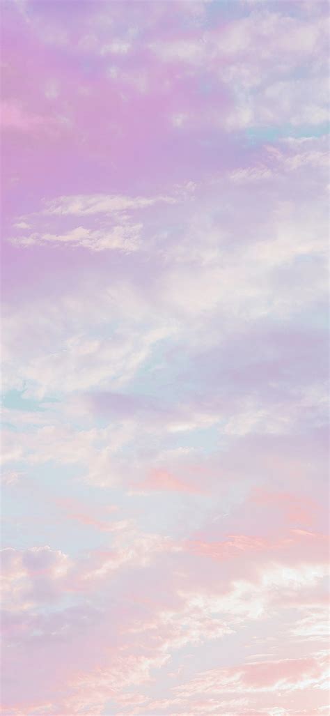 Aesthetic Sky And Light Pink Clouds 4K Phone Wallpaper