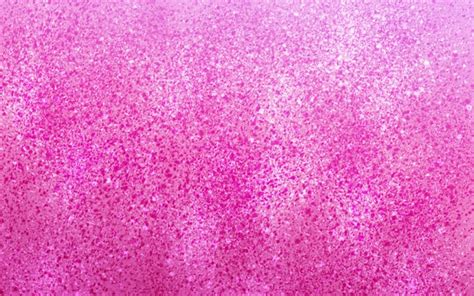 Premium Photo | Pink glitter background with a white background.