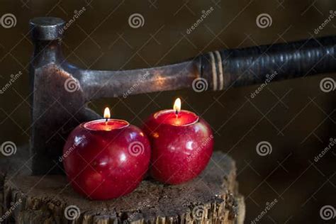 Candles In Apples With Old Hand Made Axe Stock Image Image Of Flame