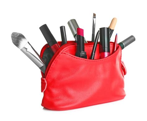 Premium Photo | Cosmetic bag with cosmetic products isolated on white