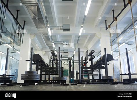 Empty gym with sport equipment Stock Photo - Alamy