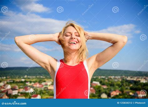 Girl Pleased With Warm Sunlight Looks Relaxed Blue Sky Background Woman Blonde Relaxing