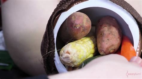 Babe Gets Carrot In Ass