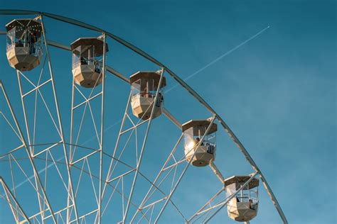 People Riding Carousel In Park · Free Stock Photo