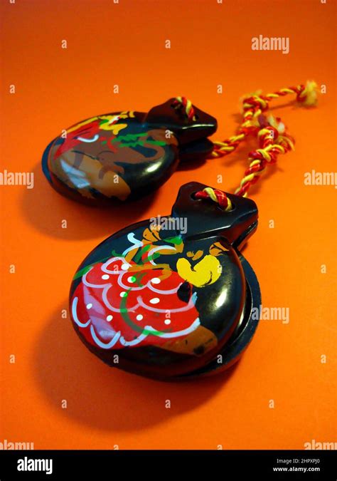 Spanish Castanets On Orange Background Stock Photo Alamy