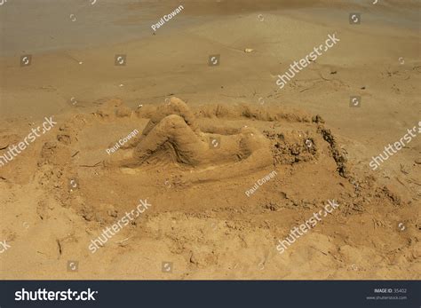 Sand Sculpture Naked Woman Sunbathing On Stock Photo Shutterstock