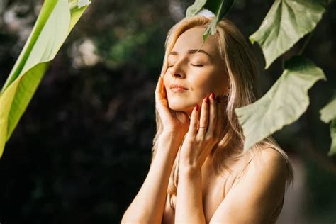 Charming Sensual Caucasian Young Woman Posing In Forest With Closed