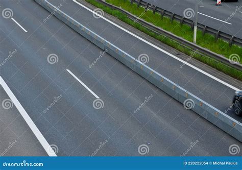 Horizontal Road Marking Lanes Highway Concrete Barriers On The Road