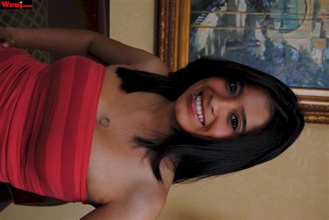 Hot Black Babe Posing In A Black Top In The Bedroom Photos